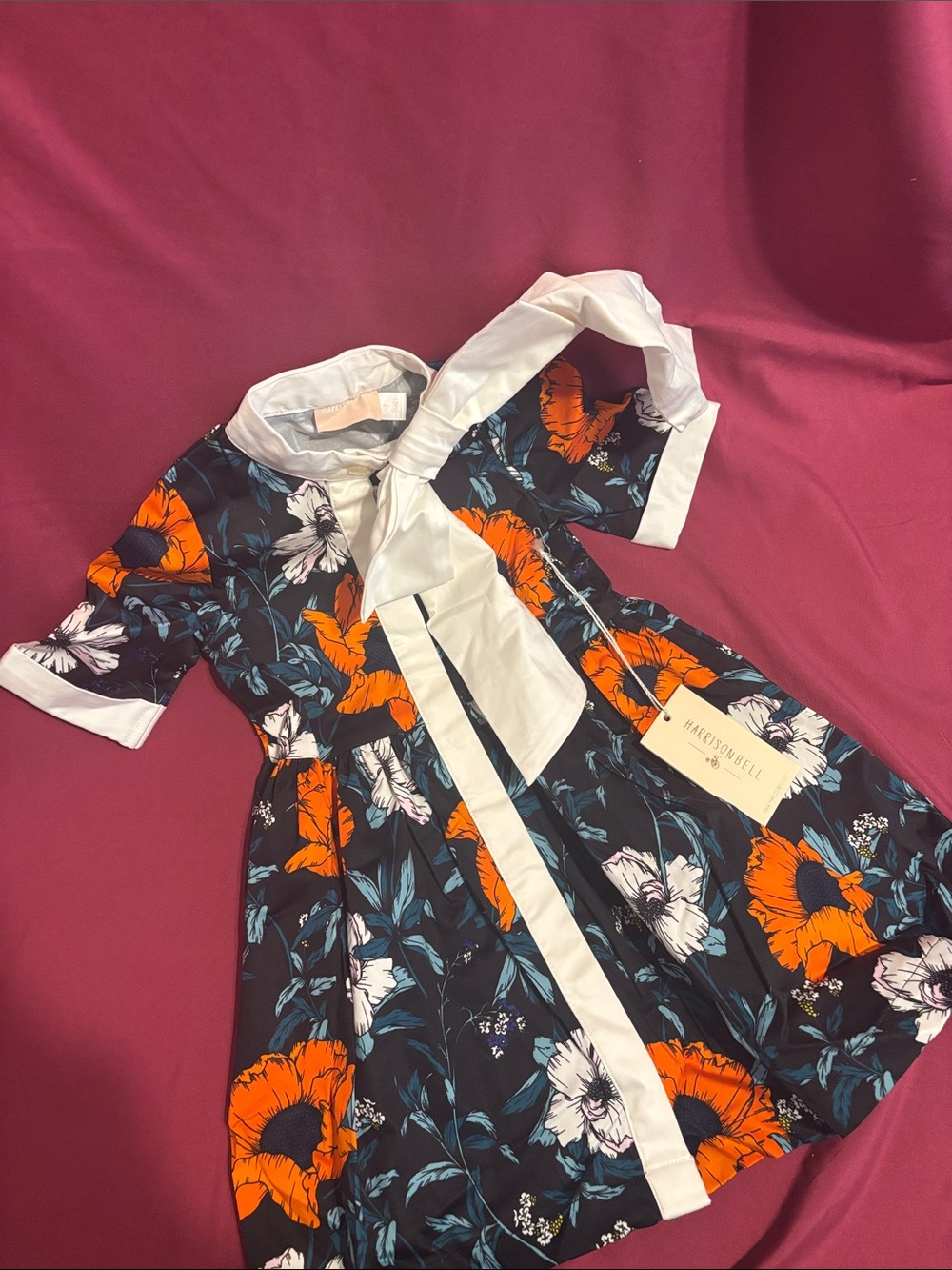 Girls' Navy Floral Dress with White Bow Trim